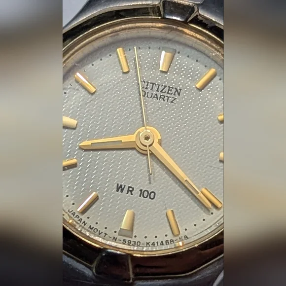 Citizen Wristwatch Silver & Gold Tone Stainless Steel Band Wr 100